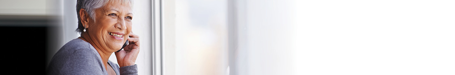 A woman speaking on a phone